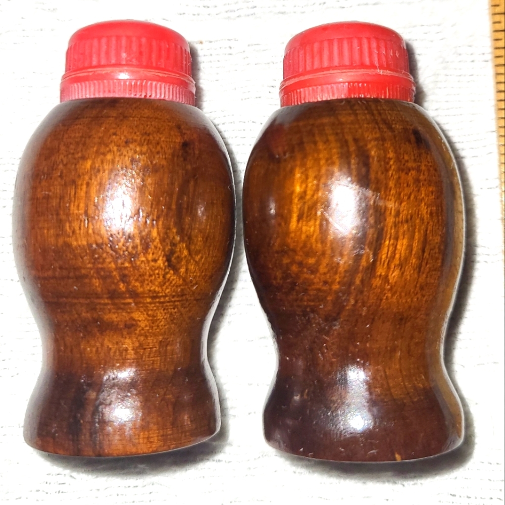 Salt and pepper shakers, wooden, vintage, w red plastic screw on caps.